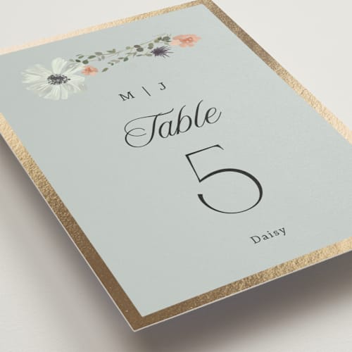 This is a mist table numbers with foil pressed by Hannah Williams called blue garden printing on doublethick in standard