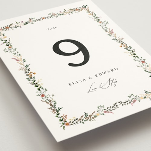 This is a blush table numbers with foil pressed by Susan Moyal called blooming vine printing on doublethick in standard