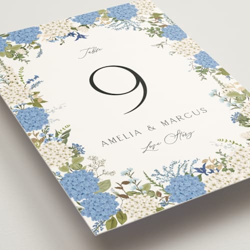 This is a coastal table numbers with foil pressed by Susan Moyal called garden whisper printing on doublethick in standard