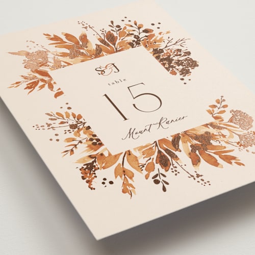 This is a rust table numbers with foil pressed by Chris Griffith called wedding in aspen printing on doublethick in standard
