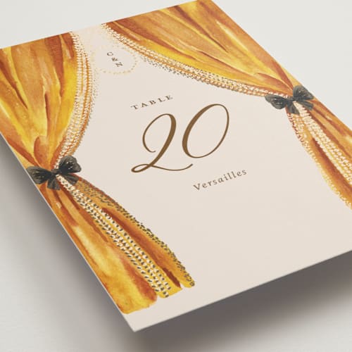 This is a golden table numbers with foil pressed by Claudia Orengo called tuileries printing on doublethick in standard