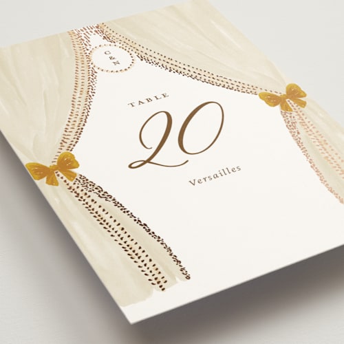 This is a amber table numbers with foil pressed by Claudia Orengo called tuileries printing on doublethick in standard