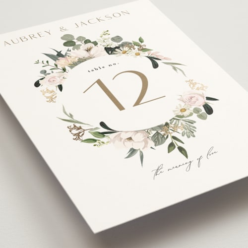This is a verdant table numbers with foil pressed by Susan Moyal called country garden printing on doublethick in standard