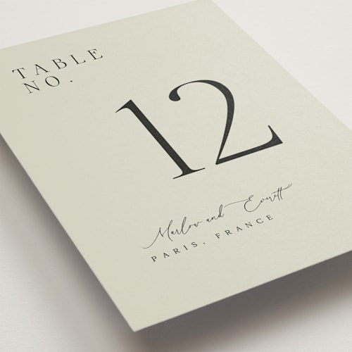 This is a spring table numbers with standard by Kelly Schmidt called scripted initials printing on doublethick in standard