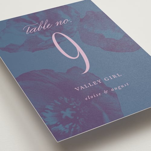 This is a peacock table numbers with standard by Morgan Kendall called maximalist poppies printing on doublethick in standard