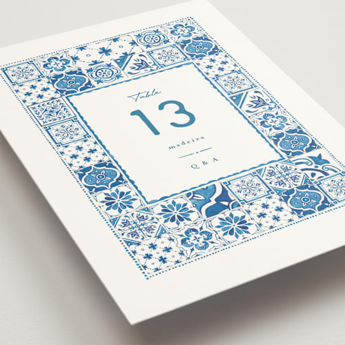 This is a navy table numbers with standard by Anastasia Makarova called watercolor tile printing on doublethick in standard
