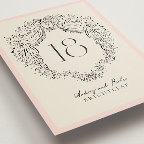 This is a peony table numbers with standard by Jackie Crawford called hand illustrated crest printing on doublethick in standard