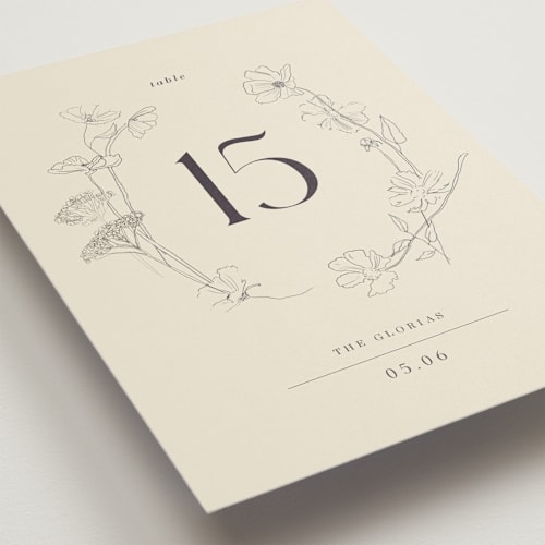 This is a ivory table numbers with standard by Baumbirdy called floral stamp printing on doublethick in standard