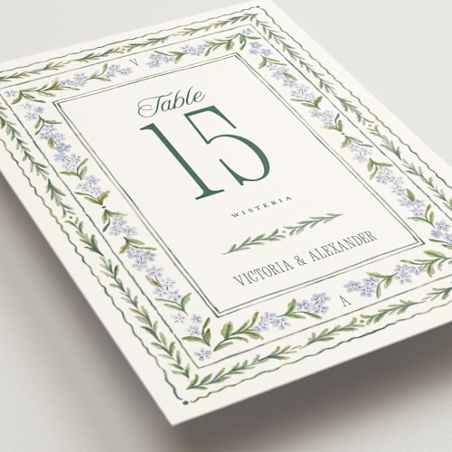 This is a wisteria table numbers with standard by Jenna Holcomb called vintage sketched printing on doublethick in standard