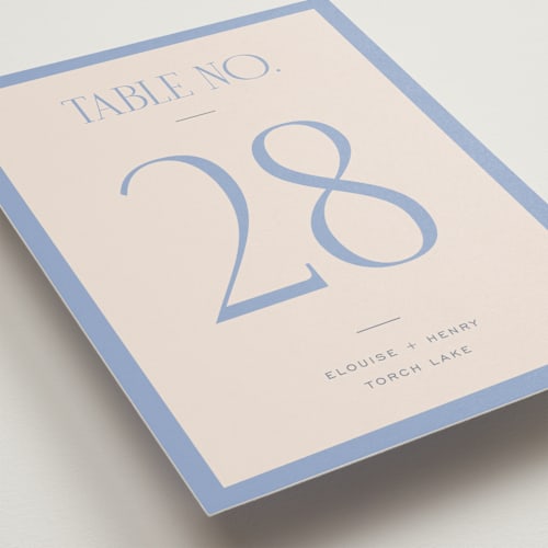 This is a canopy table numbers with standard by Pixel and Hank called threaded printing on doublethick in standard