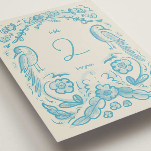 This is a cream blue table numbers with standard by Ani Somi called santa catalina printing on doublethick in standard