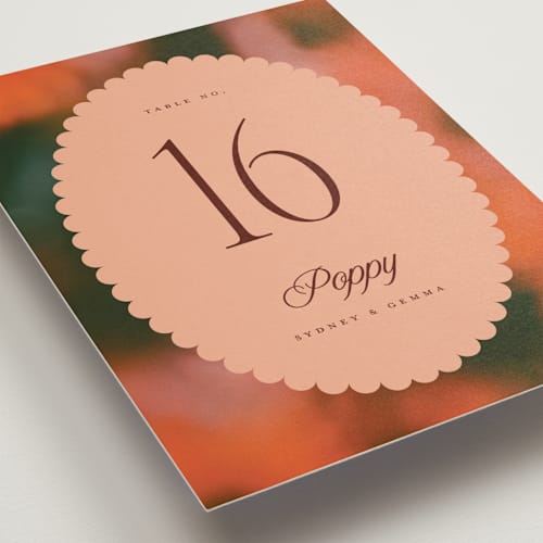 This is a poppy table numbers with standard by Morgan Kendall called bloom printing on doublethick in standard