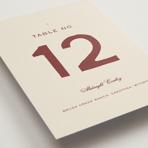 This is a rust table numbers with standard by Ani Somi called rose ink printing on doublethick in standard