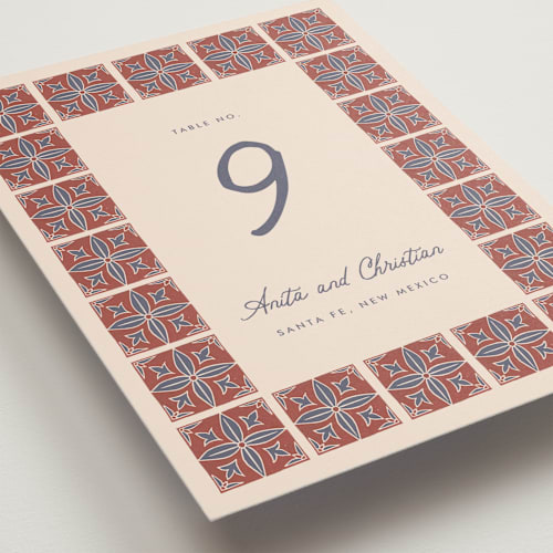 This is a terracotta table numbers with standard by Katharine Watson called block print tile printing on doublethick in standard