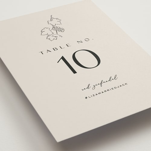 This is a stone table numbers with standard by Owl and Toad called wine label printing on doublethick in standard