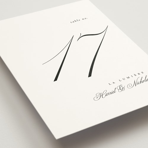 This is a noir slate table numbers with standard by Ana de Sousa called written with love printing on doublethick in standard
