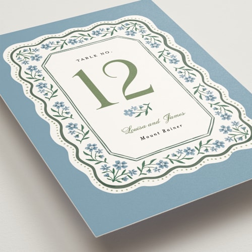 This is a periwinkle table numbers with standard by Alethea and Ruth called sweet vintage printing on doublethick in standard