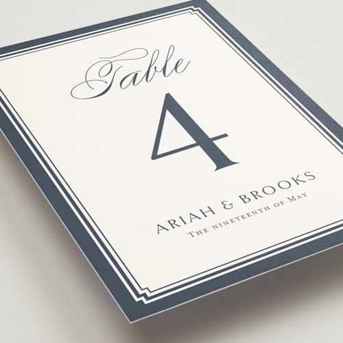 This is a french blue table numbers with standard by Jennifer Postorino called ariah printing on doublethick in standard