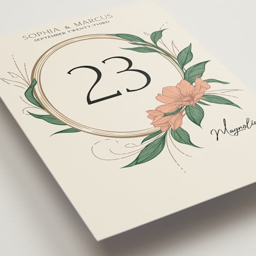 This is a almond table numbers with standard by GeekInk Design called charming printing on doublethick in standard