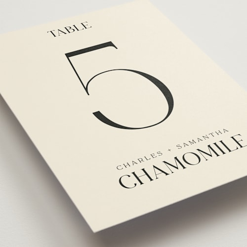 This is a cream table numbers with standard by Baumbirdy called floral emblem printing on doublethick in standard