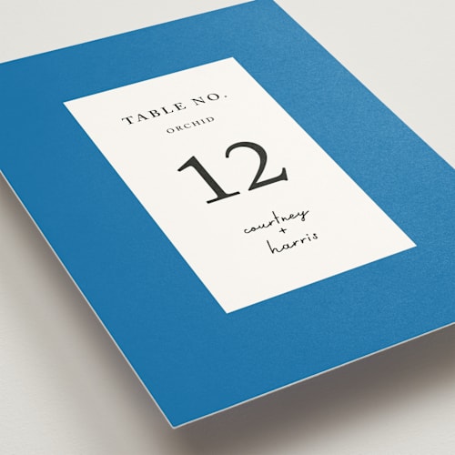 This is a cobalt table numbers with standard by mo kelley called swirl frame printing on doublethick in standard
