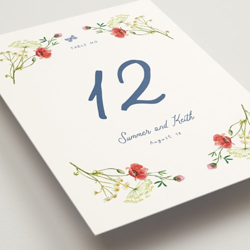 This is a ivory table numbers with standard by frau brandt called wildflower romance printing on doublethick in standard