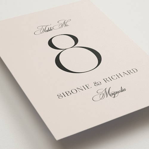 This is a ivory table numbers with standard by Melanie Kosuge called sibonie printing on doublethick in standard