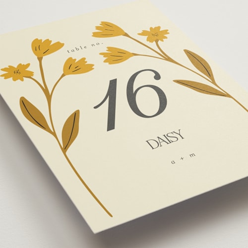 This is a yolk table numbers with standard by Morgan Kendall called vintage wildflowers printing on doublethick in standard