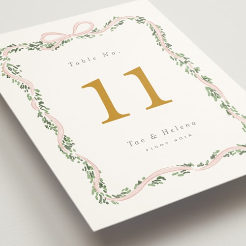 This is a blush table numbers with standard by Itsy Belle Studio called ribbonly frame printing on doublethick in standard