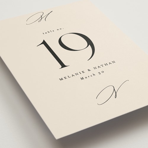 This is a ivory table numbers with standard by Angela Thompson called infinite printing on doublethick in standard