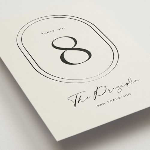 This is a latte table numbers with standard by Jackie Crawford called modern monogram printing on doublethick in standard