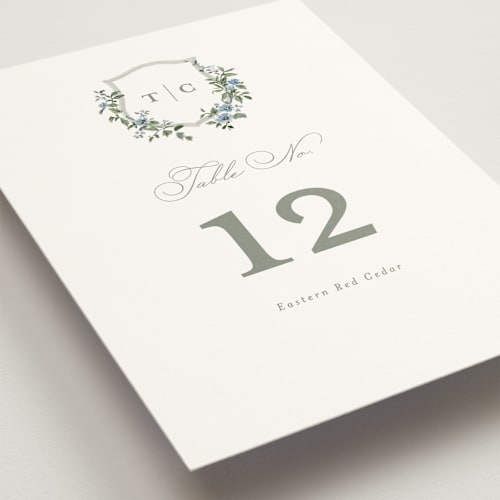 This is a sky table numbers with standard by Everett Paper Goods called foliage crest printing on doublethick in standard