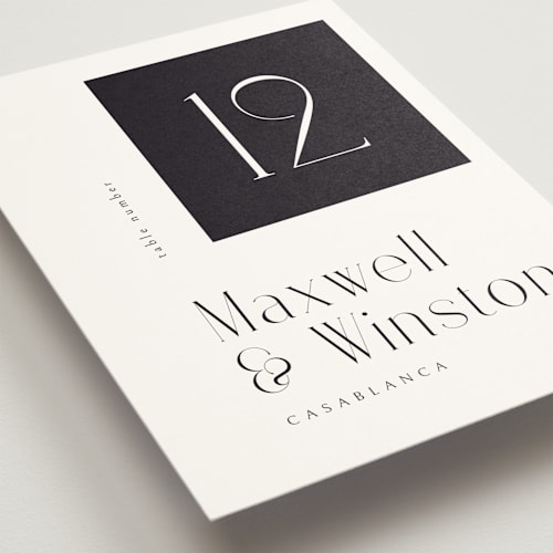 This is a tuxedo table numbers with standard by Ana de Sousa called wedding editorial printing on doublethick in standard