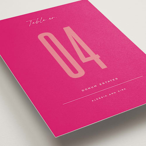This is a fruit punch table numbers with standard by Ashley DeMeyere called pop romance printing on doublethick in standard