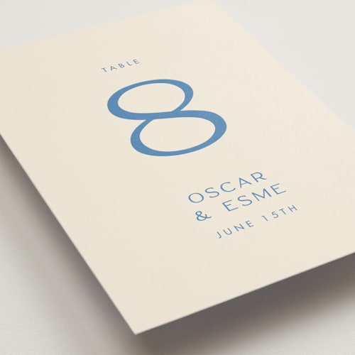 This is a cerulean table numbers with standard by Ellen Schlegelmilch called brooklyn printing on doublethick in standard