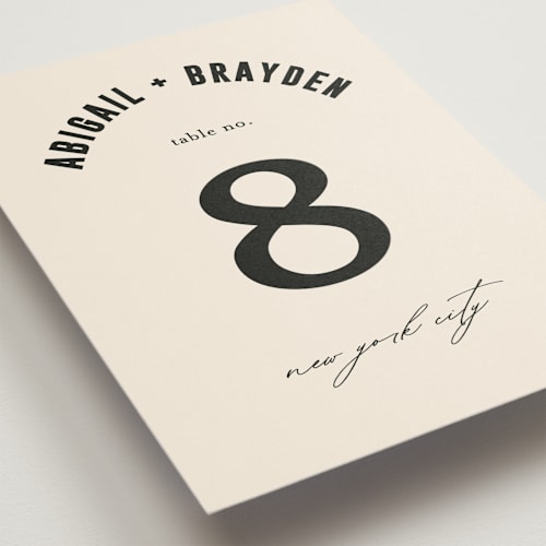 This is a cream table numbers with standard by Pixel and Hank called spin printing on doublethick in standard