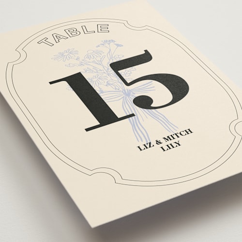 This is a daisy table numbers with standard by Baumbirdy called sealed printing on doublethick in standard