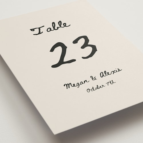 This is a lace table numbers with standard by Cass Loh called simple monogram printing on doublethick in standard