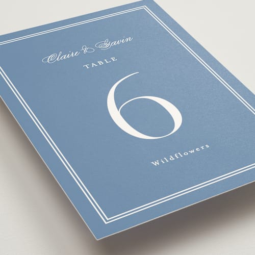 This is a french blue table numbers with standard by Carolyn MacLaren called timeless together printing on doublethick in standard