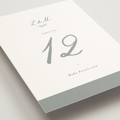 This is a sage table numbers with standard by Sara Hicks Malone called signature monogram printing on doublethick in standard