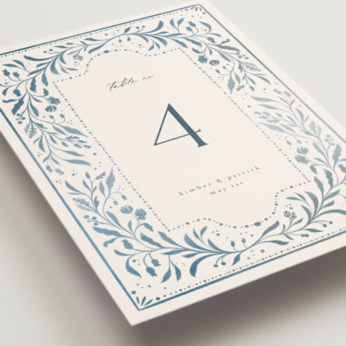 This is a delft blue table numbers with standard by Ashley DeMeyere called porcelain printing on doublethick in standard