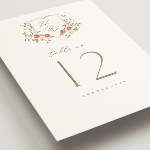 This is a pomegranate table numbers with standard by Everett Paper Goods called roses crest printing on doublethick in standard
