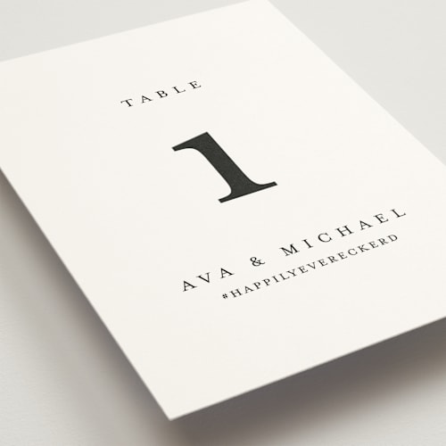 This is a obsidian table numbers with standard by Jennifer Postorino called delicate printing on doublethick in standard