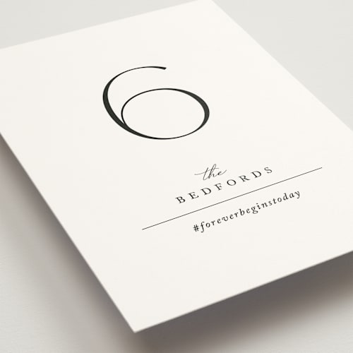 This is a pearl table numbers with standard by Jennifer Postorino called initial printing on signature in standard