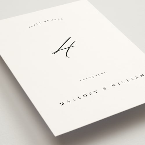 This is a ecru table numbers with standard by Anna Elder called cielo printing on signature in standard