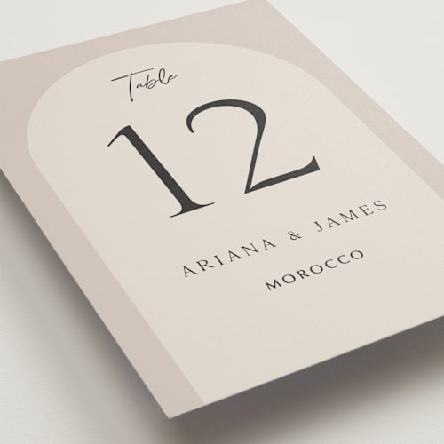 This is a stone table numbers with standard by Elly called the arch printing on signature in standard