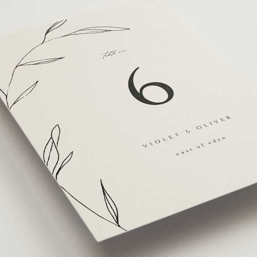 This is a taupe table numbers with standard by Kelly Schmidt called waldorf printing on signature in standard