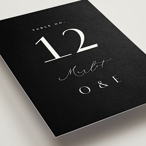 This is a onyx table numbers with standard by Emily Betts called modern classic names printing on doublethick in standard