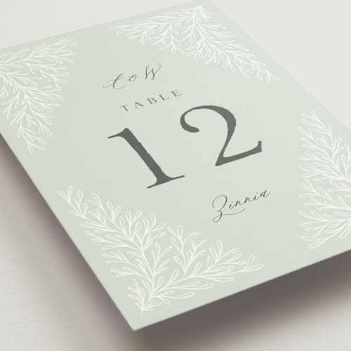 This is a sage table numbers with standard by Kristen Knechtel called fairy forest printing on doublethick in standard