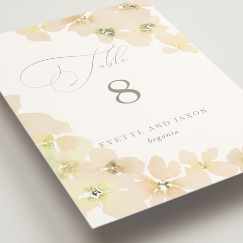 This is a peach blooms table numbers with standard by Design Lotus called whispered printing on doublethick in standard